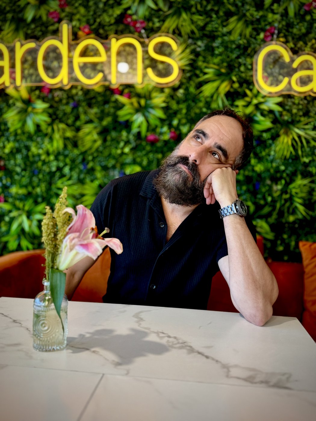 Andrew off-stage at a cafe